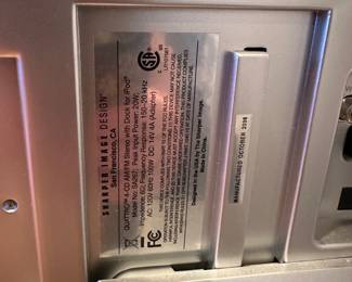 R28 - $35. Sharper Image Quattro 4-CD AM/FM Stereo with Dock for iPod. Model SA267. CD Player with pair of floor speakers.  Manufactured 2006. 