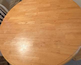 R93 - $100. Round wood top dining table. 2 chairs are good - 1 needs repair. 