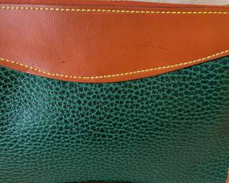 R48 - $30. Vintage Dooney & Bourke Green & Tan Crossbody Bag. Measures 10" wide x 7" tall x 3" deep. 