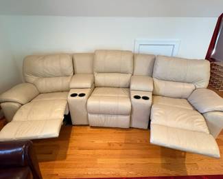 R1 - $350 Each. *2 Available* Haverty's Motion Leather Reclining Sofa. 3 seats - both ends are recliners. Moves in 5 Pieces. Assembled it is 113" long x 38" deep x 38" tall. Floor to Seat is 18.5".  These are located on the 3rd floor. YOU NEED 2 STRONG PEOPLE to move!