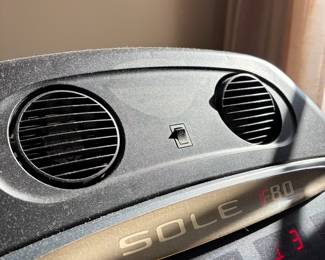 R98 - $150. Reliable Sole F80 treadmill. Has a clear console with incline and speed controls. Pulse grip feature for heart rate monitoring. Message board provides helpful info during workouts.  Has some wear and flaws, see photos. Please bring help to move!