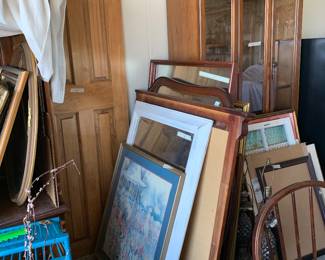 Lots of large mirrors and frames. 