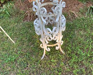 Antique heavy iron plant stand or put a glass on for small table. 