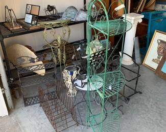 Lots of iron, garden stands, shelfs, plant stands 