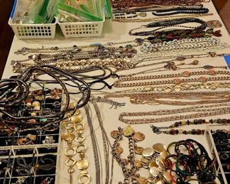 Necklaces and lots of earrings 