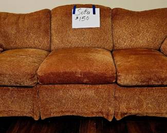 Solid sofa in good condition.