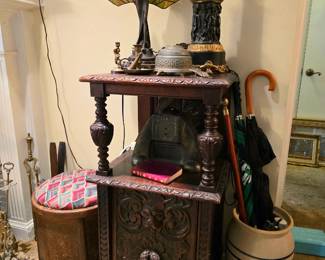 Highly carved antique coal scuttle table