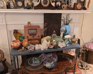 Vintage and antique clocks; antique radio; pottery & porcelain; scalloped wood & glass top coffee table