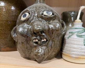Face pottery - signed