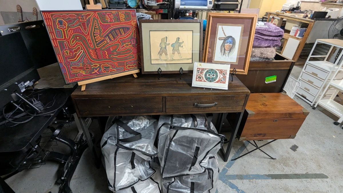 Native American art, entry table, 4 large bags of women's clothes, vintage MCM writing desk with stand.