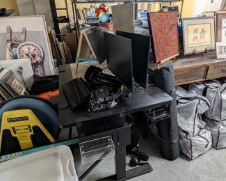 Electric height adjustable desk, computer monitors, adjustable dual monitor mount, photography light studio box, fitness equipment, Native American art, entry table, large bags of women's clothing, and more.