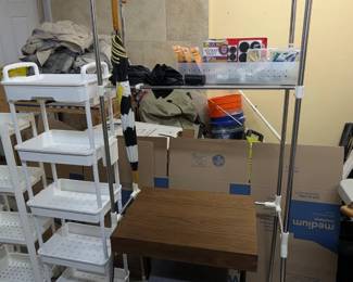 Landry clothing storage organizer rack, side table with drawer, foot rest with storage, rolling shelves and carts, umbrellas, and more.