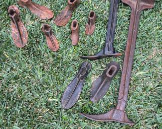 Vintage Cobbler’s shoe last’s and their accompanying iron stands 