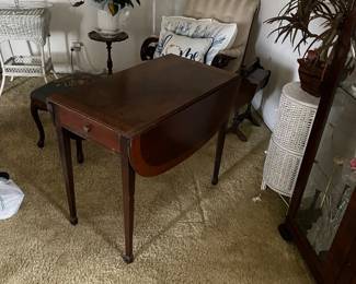 Vintage padfoot dropside table, with hinged leaves.