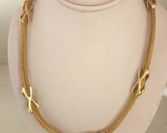 18 kt gold necklace. Double strand with X accents