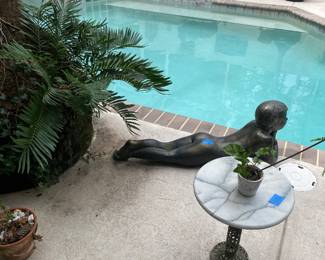 Concrete sculptures, pots, tables etc