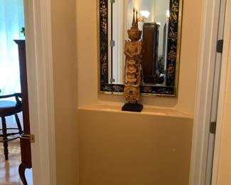 Vintage mirror and Asian statue