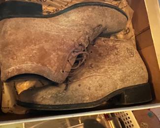 These are distressed suede lace-up boots by Ariat.