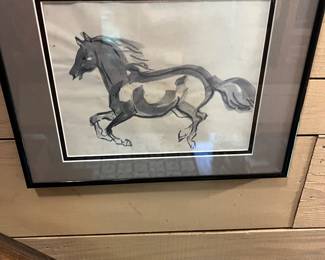 Ink wash painting of a galloping horse, likely in the style of Xu Beihong.