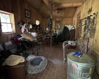 Tack room full of variety of items. 