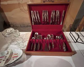Three sets of flatware 