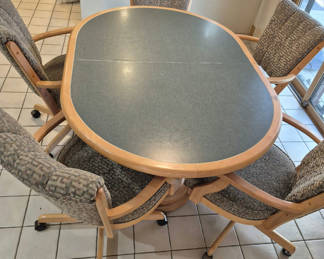 Lot 42: Oval kitchen table with 5 chairs