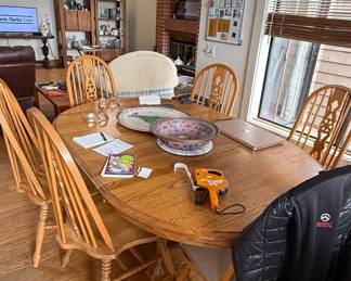 Oak Pedestal Dining Table with Spindle-Back Chairs