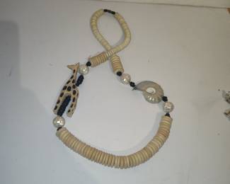 Hand Carved Bone Giraffe and Nautilus Shell Necklace