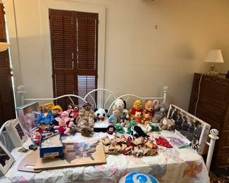 Collection of Assorted Plush Toys and Collectible Dolls