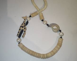 Hand Carved Bone Giraffe and Nautilus Shell Necklace