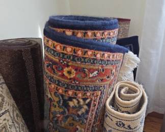 Assorted Rolled Rugs