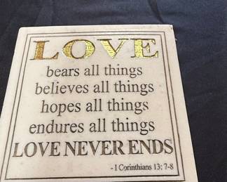 Love Never Ends Decorative Plaque