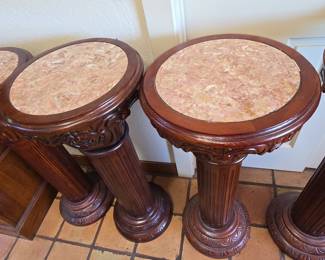 Set of Four Carved Wood Pedestal Stands with Marble Tops