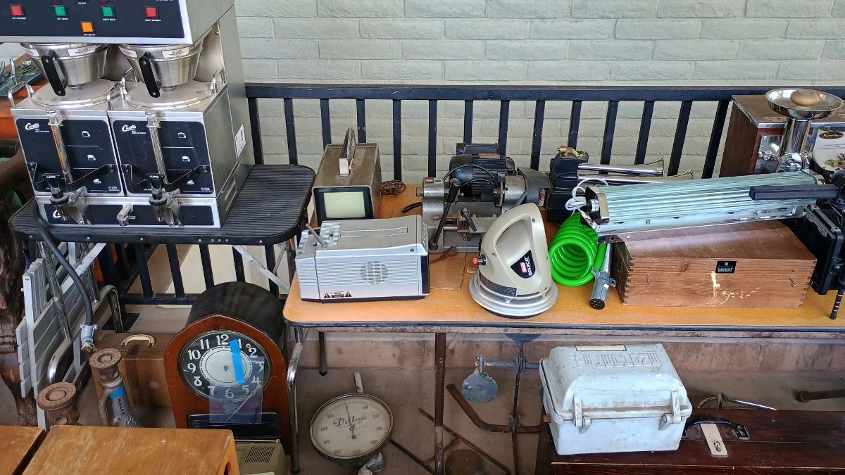 Vintage collectible items, antique clocks, signs, vintage furniture, machinery, restaurant items