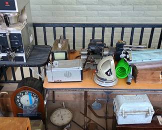 Vintage collectible items, antique clocks, signs, vintage furniture, machinery, restaurant items