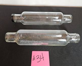 Item #34 Two Glass Rolling pins (one missing cap) $38