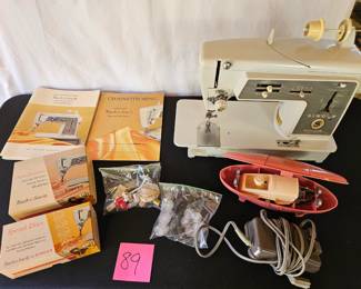 Item #89 Singer Sewing & Accessories $100