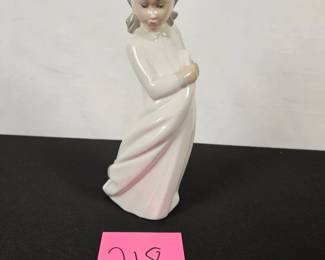 Item #218 Nao girl in nightgown $20