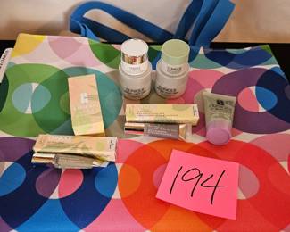 Item #194 Large Clinique bag and assorted makeup/skincare (expiration unknown) $15