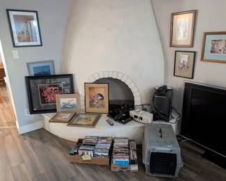 Coy fish silk art, dog carrier, Bose radio, Blu-Ray player, universal remote