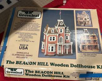 New in the box wood doll house to put togetger