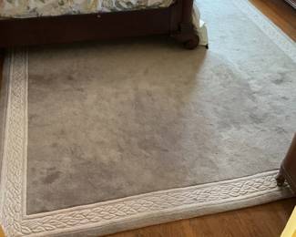 Large Area Rug with Braided Border Detail
