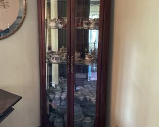 Howard Miller Cherry Curio Cabinet