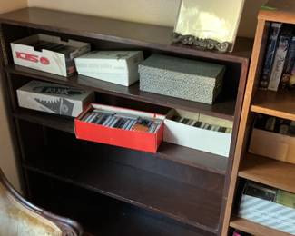 Dark Wood Bookcase with Assorted Contents