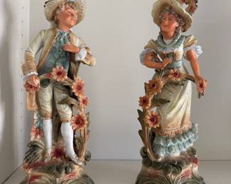 Modified (tanned) man and woman figurines