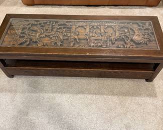 Top of glass covered coffee table