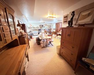 Basment filled with antique furniture, and collectables