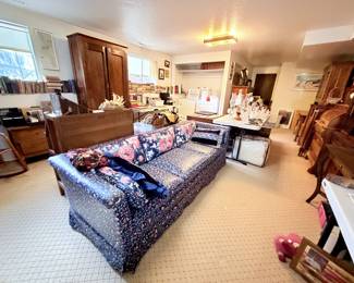 Antique chintz floral couch, Antique armoire, rolltop desk, Hurricane lamps