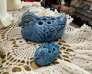 Pair of blue ceramic bird flower frogs featuring multiple stem openings and detailed form. Adorable vintage pieces perfect for floral arranging or display.