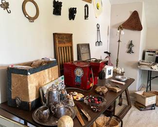 Snapshot of assorted antiques, vintage glassware, framed art, and decorative pieces. Great mix of items throughout the sale with something for every style.